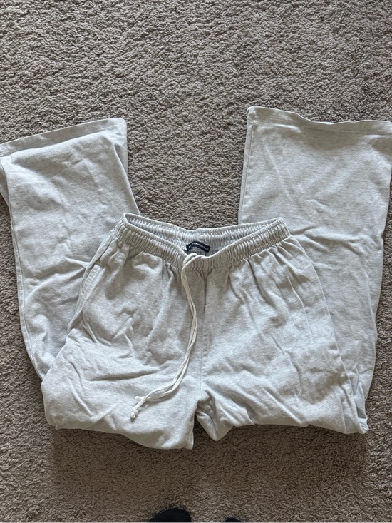 Brandy Melville Pants - Brandy Melville grey flare sweats